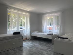 Postel nebo postele na pokoji v ubytování Wynajem Pokoi JULIA