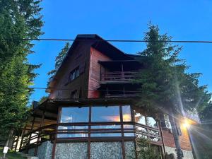 a building with a lot of windows on the side of it at Whispering Pines in Šišava