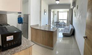Kuchyň nebo kuchyňský kout v ubytování Apartamento en Boca Chica T2 706