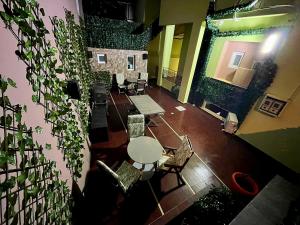 an overhead view of a room with a table and plants at knezevic resorts 14 in Mesochórion