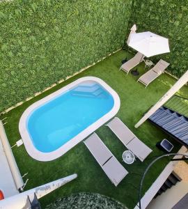 an overhead view of a swimming pool in a yard at Lisbon City Hollywood Hotel by City Hotels in Lisbon