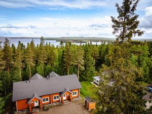an aerial view of a house in the woods at Villa Pyry in Vuokatti
