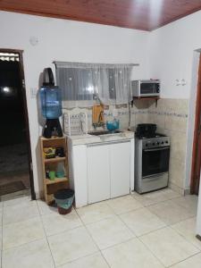 Кухня или мини-кухня в Acuario Departamentos
