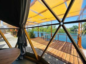 a view from the inside of a boat with a wooden deck at In Out in Antalya