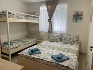 En eller flere senge i et værelse på Rusalka Apart-Residence + 125 billeder