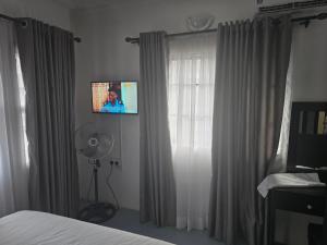 TV a/nebo společenská místnost v ubytování Crasto Suites