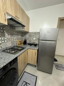 Kuchyň nebo kuchyňský kout v ubytování Superbe appartement Anza
