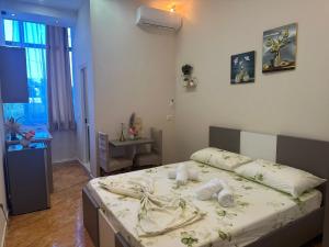 Postel nebo postele na pokoji v ubytování Hotel Osmani