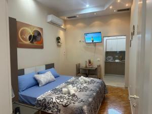 Postel nebo postele na pokoji v ubytování Hotel Osmani