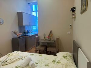 Postel nebo postele na pokoji v ubytování Hotel Osmani