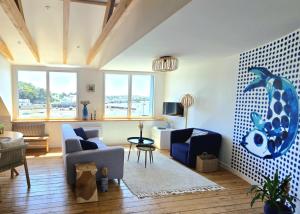 Posezení v ubytování Anatoline Audierne Appart'hôtel - Appartements vue Mer - Sea & Harbor Stay