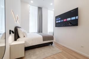 TV o dispositivi per l'intrattenimento presso Hotel Eleven