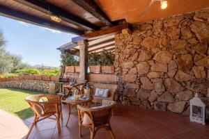 Patio nebo venkovní prostory v ubytování Esclusiva Punta Volpe, Villetta con Accesso sul Mare