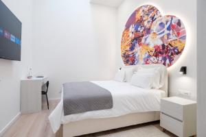 Letto o letti in una camera di Hotel Eleven