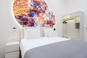 Letto o letti in una camera di Hotel Eleven
