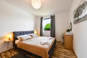 Postel nebo postele na pokoji v ubytování Holiday Home Ostrun
