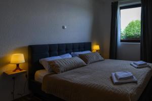 Postel nebo postele na pokoji v ubytování Holiday Home Ostrun