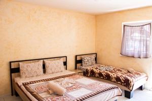 Letto o letti in una camera di Hotel BILYI AIST