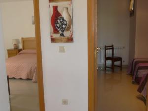 Postel nebo postele na pokoji v ubytování Sanxenxo Apartamento Docasar 1 izquierda