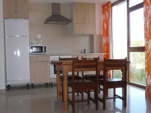Kuchyň nebo kuchyňský kout v ubytování Sanxenxo Apartamento Docasar 1 izquierda