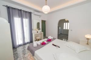Giường trong phòng chung tại The F Suites