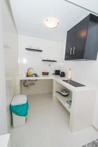Nhà bếp/bếp nhỏ tại The F Suites