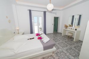 Giường trong phòng chung tại The F Suites