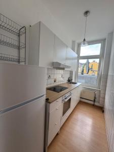 Dapur atau dapur kecil di DownTown Appartement Monteurs Ferienunterkunft