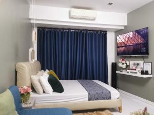 Katil atau katil-katil dalam bilik di Elite Pod at Knightsbridge Residences Makati +34 gambar
