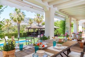 The swimming pool at or close to Ocean Views Luxury Villa next to beach