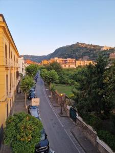 a street with cars parked on the side of the road at De Angelis Apartments - GOLD in Sant'Agnello