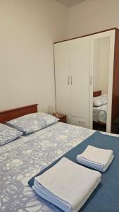 Postel nebo postele na pokoji v ubytování Villa Lucija