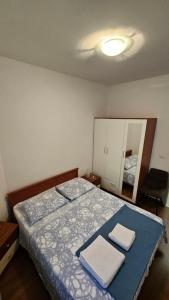 Postel nebo postele na pokoji v ubytování Villa Lucija