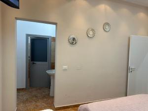 Postel nebo postele na pokoji v ubytování Hotel Osmani