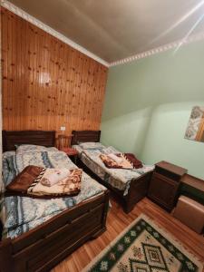 Ένα ή περισσότερα κρεβάτια σε δωμάτιο στο guest house FANGANI