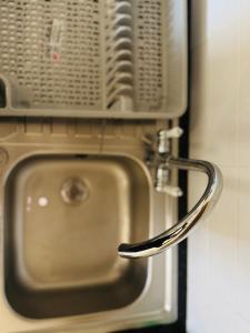 a close up of a door with a metal latch at Large Room Near City Centre in Belfast
