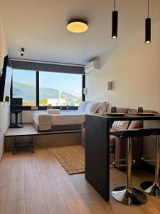 Postel nebo postele na pokoji v ubytování NôM