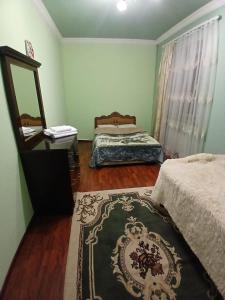 Ένα ή περισσότερα κρεβάτια σε δωμάτιο στο Family house