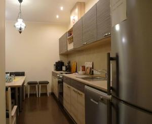 Kuchyň nebo kuchyňský kout v ubytování Feyena Guesthouse