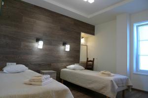 Postel nebo postele na pokoji v ubytování Feyena Guesthouse