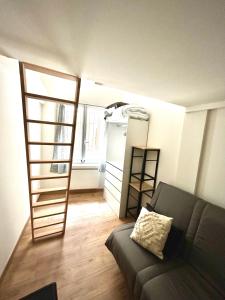 Posezení v ubytování Studio atypique en RDC