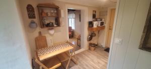 Η κουζίνα ή μικρή κουζίνα στο Eldhuset cabin