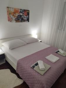 Postel nebo postele na pokoji v ubytování Apartman Bubli