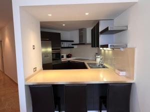 Η κουζίνα ή μικρή κουζίνα στο Bahia - 2 bedroom seafront