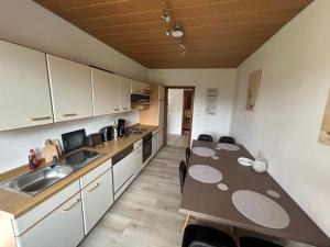 Kuchyň nebo kuchyňský kout v ubytování Gasthaus Bergmann