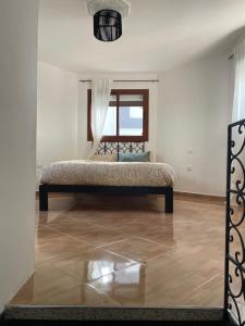 Postelja oz. postelje v sobi nastanitve Syrah Home