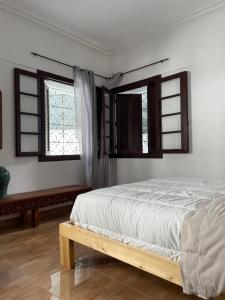 Postelja oz. postelje v sobi nastanitve Syrah Home
