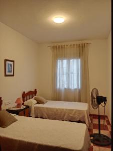 Ένα ή περισσότερα κρεβάτια σε δωμάτιο στο En casa de la Daguilla