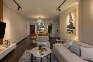Zona d'estar a Marassi Views Direct on Pool 3BR Beach Access by Best of Bedz