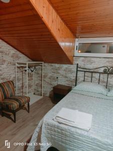 Postel nebo postele na pokoji v ubytování BB Cesarò Mariolo house